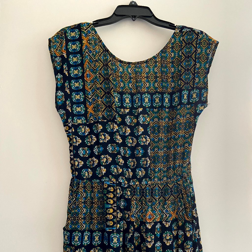 Multi-Patterned Romper With Back Bow